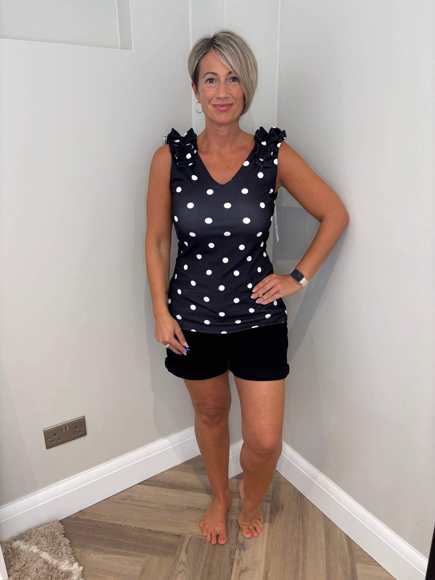 Polka Ruffle Shoulder Vest in Black